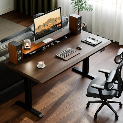 Rock Solid Electric Standing Desk Crafted From Genuine Solid Rubberwood Desktop With Quick Motorized Height Adjustment For Comfortable Home Office Computer Workstation, top view with monitor and speakers.