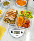 Primo Digital Food Scale For Precise Weighin, Portion Control, And Baking Prep under meal prep container with chicken and veggies