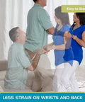 Universal Standing Handle Sit To Stand Transfer Aid assisting woman from seated to standing with support.