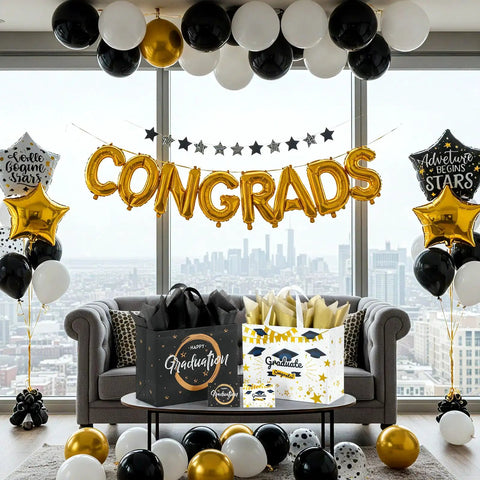 Two Pack 13 Inch Graduation Gift Bags With Tissue Paper Reusable Nonwoven Gift Bags With Handles 12.8 X 10.2 X 6.3 Inch Size Perfect For Grads Class Of 2026 College High School Or 8th Grade Graduation Includes Wrapping Paper Greeting Cards And Stickers on a decorated table with balloons and CONGRADS banner.
