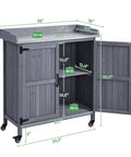 Mobile Outdoor Potting Bench Table with Castors on Wheels, solid wood, large storage cabinet, metal top, gray shown with measurements