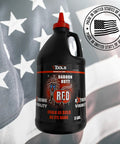 Three Pound Baboon Butt Red Extreme Visibility Marking Chalk with USA flag background, 3 lb bottle for construction use.