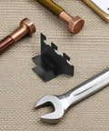 Beefy Heavy Duty Stainless Steel Shelf Brackets With Square Tube Design beside wrench and bolts on woven surface