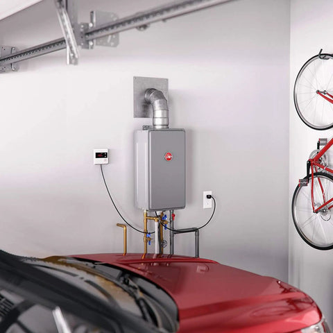 Indoor Natural Gas Tankless Water Heater Serves Up A Smooth Seven GPM Stream With EcoNet Smart Monitoring mounted in garage.