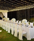 Outdoor LED Curtain Lights 30 Ft by 10 Ft With 720 LEDs, Plug In Hanging String Lights, used as twinkle backdrop for wedding decor