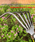 Close-up of Five Claw Landscape Garden Rake Dethatcher with stainless steel claws, green background