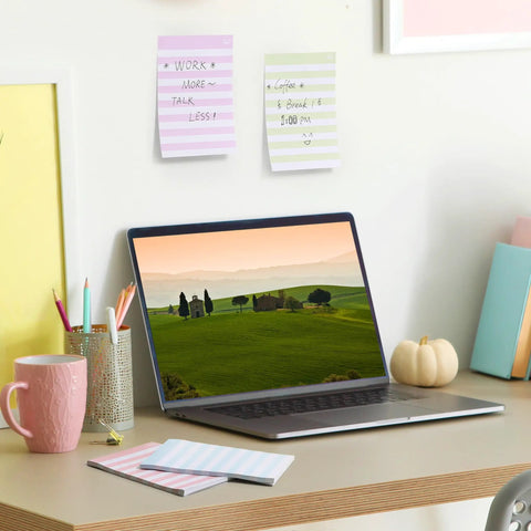 Lined Sticky Notes 4x6 Inch, 6 Pads With 45 Sheets Each on an office desk with a laptop and stationery, hung on wall.
