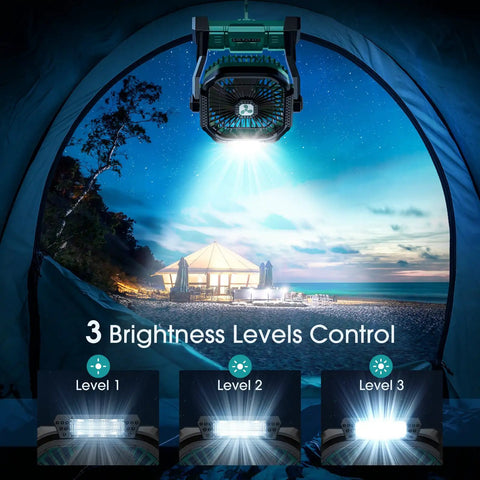 Rechargeable Portable Fan With 20000mAh Battery and LED Lantern lighting a tent at a beach.