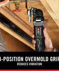 Hand using 3 Amp Oscillating Multi Tool Kit With 52 Pieces, Variable Speed, Tool Free Blade Change, 3 Position Overmold Handle