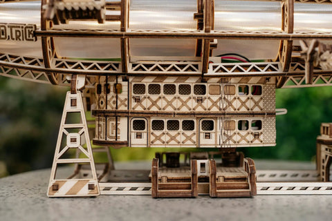 Luminous Zeppelin LED 3D Wooden Puzzle Kit For Adults, detailed view of vintage airship model on table with stand support