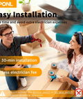 Couple high-fiving with 52 Inch Ceiling Fan With Lights And Remote, Black Finish, in living room setting, installation box nearby.