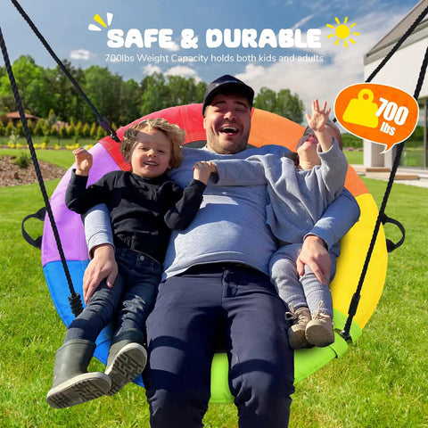 Family enjoying 700 Lb 40 Inch Rainbow Saucer Tree Swing For Kids And Adults Outdoor with Textilene Fabric, seated together.