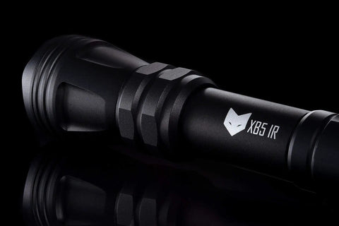 Close-up of Infrared Night Vision Flashlight 850nm IR Illuminator, 5W LED, Rapid Focus, Dimmable, black design, reflective surface