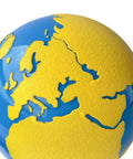 Close-up of Sandpaper Globe For Sensory Geography Learning Land And Water Tactile Globe In Solid Beechwood showing textured continents.