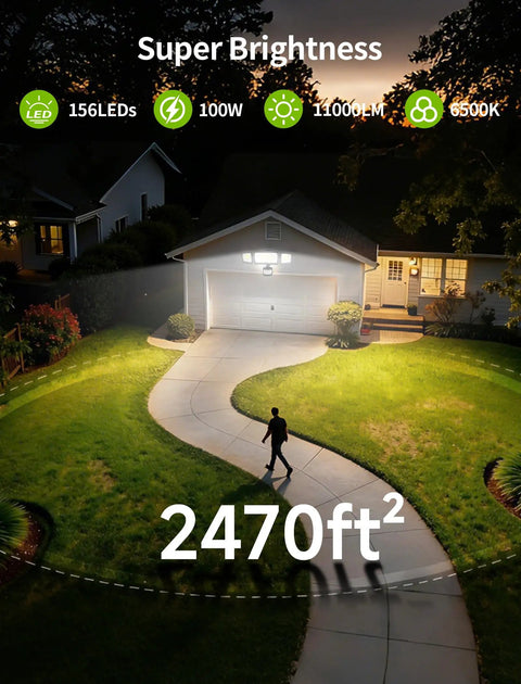 Beastly Bright 100W LED Security Flood Light With 11000 Lumens, 3 Adjustable Heads, Motion Sensor, illuminating a yard and garage