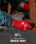 Person wearing FX3 Nitrile Coated Grip Work Gloves For Tough Jobs, Tear And Abrasion Resistant, working on construction.