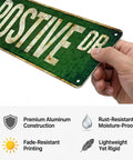 Dope Vintage Aluminum Street Quote Plaque Wall Art For Bedroom Office Gym in hand, measuring 15 by 4 inches, rustic green finish.