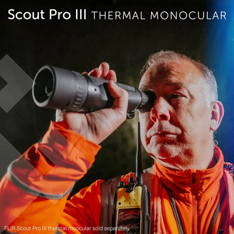Person using Scout Pro III thermal monocular in field