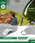 Triangle Sun Shade Sail 8x8x8 Foot Outdoor Canopy For Pergola Backyard Deck Garden UV Resistant HDPE Fabric With Reinforced Edges And D Rings Keeps Direct Sunlight Off While Letting Cool Breezes In, installed over outdoor dining area, showing reinforced D-rings and curved edges.