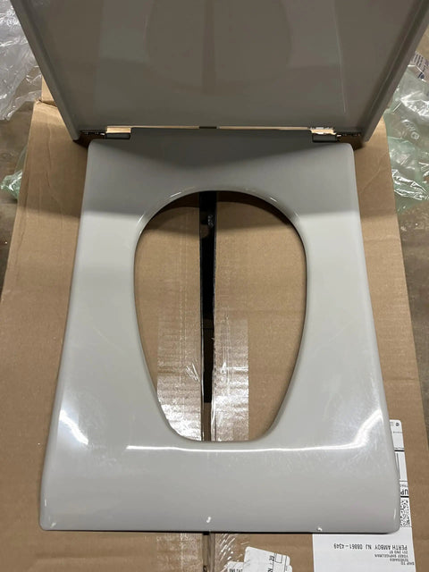 Slick Pillow Talk Toilet Seat In Clean Ice Grey Featuring Smooth Soft Close Hinges And Heavy Duty Top Loading Mount for installation.