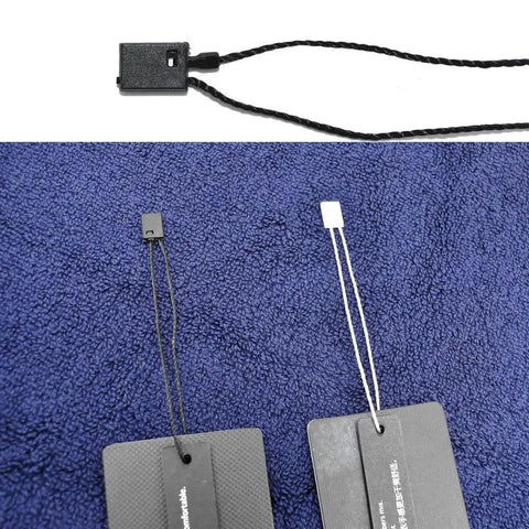 Heavy Duty Nylon Hang Tag Strings With Self Locking Quick Snap Binders 7 Inch displaying black and white fasteners on fabric.