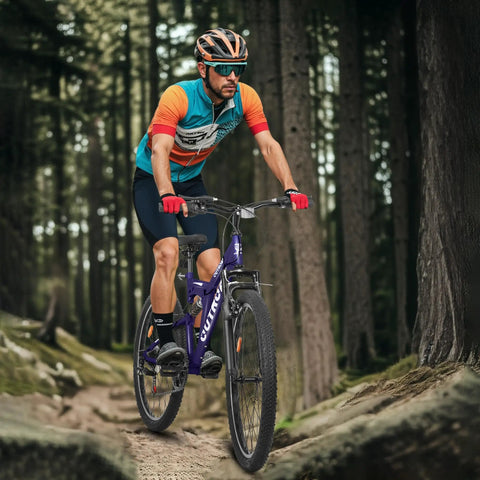 Cyclist on All Terrain Mountain Hybrid Bike With 26 Inch Steel Frame 7 Speed MTB Bicycle Front Suspension Fork on forest trail