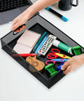 Hands holding a Two Pack Metal Mesh Desk Drawer Organizer Tray Set With Handles, Heavy-Duty Steel Desktop Storage filled with office supplies.