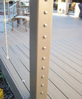 Self Locking Swageless Quick Connector for One Eighth Inch Cable Railings on composite post with stainless dome caps