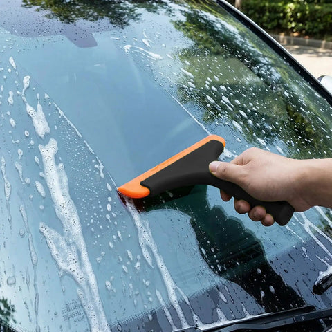 Person using squeegee from All-In-One Vinyl Wrap Heat Gun Kit For Cars And Window Tinting, 1800W 110V Hot Air Tool With Squeegees, Vinyl Cutter.