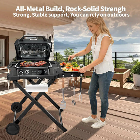 Heavy Duty Foldable Outdoor Grill Stand With Wide Ninja Woodfire And Blackstone Compatibility on a patio, woman placing food.