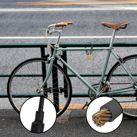 Heavy Duty Stainless Steel Wire Rope With PVC Coated Loop Ends securing a bicycle, close-up on cable with braided construction and lock.