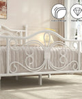 Full Size Metal Bed Frame Featuring Sculpted Butterfly Pattern Headboard In Shimmering White Polished Finish, showcasing curved design and sturdy metal supports.