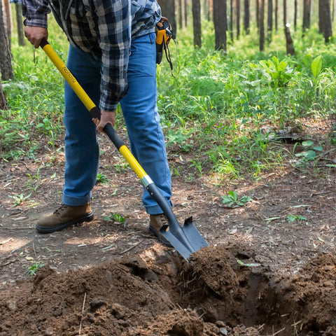 Person using Heavy Duty Digging Shovel With Fiberglass Handle 58 Inch Length For Quick Dirt Penetration High Carbon Steel Blade
