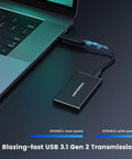 Image of 500GB Portable External SSD USB 3.1 Gen2 Drive With Metal Casing connected to a laptop, showcasing sleek design.