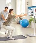 Mobile Floor Stand For Monitors And TVs Up To 35 Inches Weighing 22 Lbs With Anti Knockdown Base in rehab setting