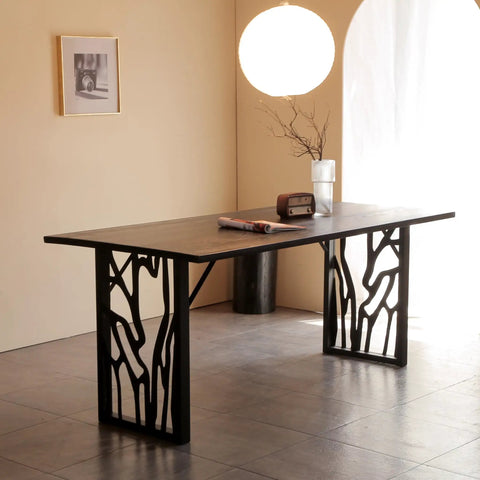 28 Inch Metal Table Legs Set Of 2 Built Tough Heavy Duty Industrial Modern Desk Bases With Laser Engraving Cutout Pattern Rectangular Frame For Stable Dining Table Corrosion Resistant Baked Finish in a room setting with wooden tabletop.
