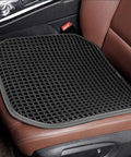 Black Summer Cooling Ventilated Mesh Seat Cushion Pad For Cars And Trucks Breathable Seat Cover on a brown car seat