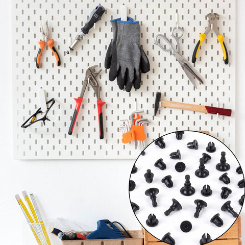 Fifty Black Push Lock Pins For Media Centers And Equipment Panels Rock Solid Expanding Fasteners on pegboard with tools.