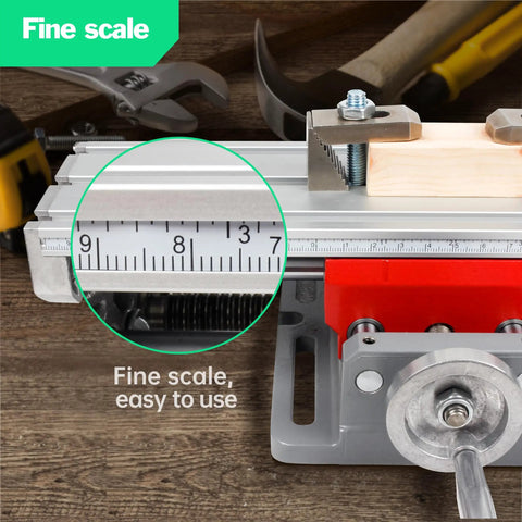 XY Axis Slide Vise AB8303 close-up of fine scale with clamp and crank handle, highlighting precision measurements and adjustments.