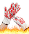 Extreme Heat Resistant Oven Gloves With Five Finger Design For Grill Masters BBQ Cookin Mitts For Cooking Silicone Non Slip Kitchen Gloves For Grilling Baking And Hot Oven Use Red, showing red silicone grip, flame background.