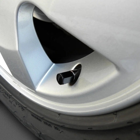 Dodge SRT Black Logo Tire Valve Stem Caps Set For Your Wheels Durable Valve Caps With Genuine Fit Sleek Black Finish Easy Install Works With Most Vehicles Part EL5050585 installed on car wheel