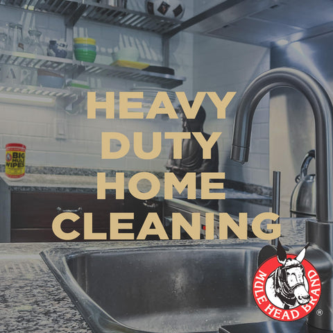 Oversized 10x12 Cleaning Wipes for all-purpose garage and auto cleanup, next to a kitchen sink with heavy-duty and gentle formula.