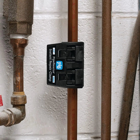 Top Shelf Instant Pipe Repair Clamp For Half Inch Diameter Pipes mounted on copper pipe for emergency watertight leak patch.