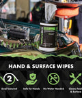 NatureGrit Hand & Surface Wipes tub with green label on a car hood in a workshop.