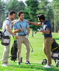 Golfers with 2 Pack Go-To Golf Ball Storage Bags With Nylon Mesh Pouches enjoying a day at the range on a sunny green course.