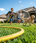 Yellow Short Garden Hose 3/4 Inch By 10 Feet No Kink Leak Free Flexible PVC Water Hose with kids and dog on lawn