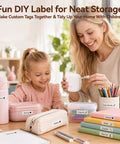 Gotta Love This Straight Up Compact Bluetooth Label Printer With Self Adhesive Tape Wireless Thermal Mini Label Maker Featuring Rechargeable Battery And Built In Cutter For No Sweat Home Office Or Kitchen Organization in use by mother and daughter making labels.