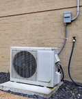 Three Quarter Inch Six Foot Liquid Tight PVC Electrical Conduit Kit installed with HVAC unit against brick wall.