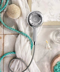 Quattro Handheld Shower System With Four Modes Relieve Soothe Clarify Cleanse Magnetix Dock Chrome Finish in spa setting
