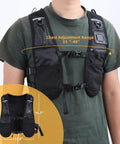 Person wearing Lightweight Hydration Running Vest Pack With Adjustable Chest Straps And Front Pockets For Easy Hydration On The Go